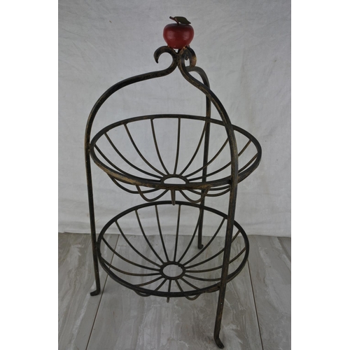 756 - A two tier fruit basket. approx 50cm.