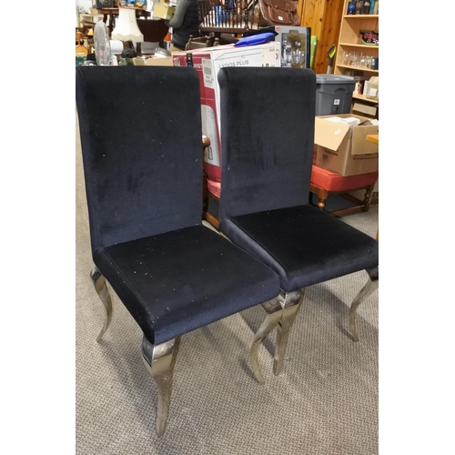 762 - A pair of upholstered chairs on silver gilt metal legs.