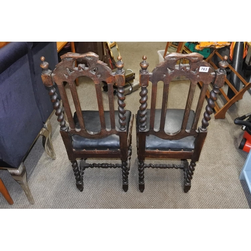 763 - A pair of antique barley twist oak chairs.