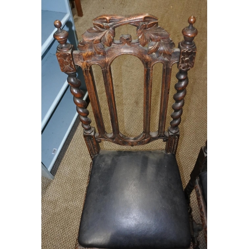 763 - A pair of antique barley twist oak chairs.