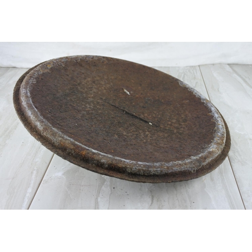 764 - An antique pot lid. approx 38cm.