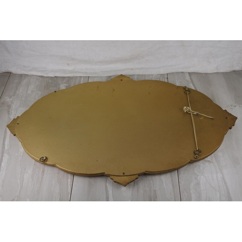 771 - A stunning gilt framed wall mirror. approx 73x47cm.