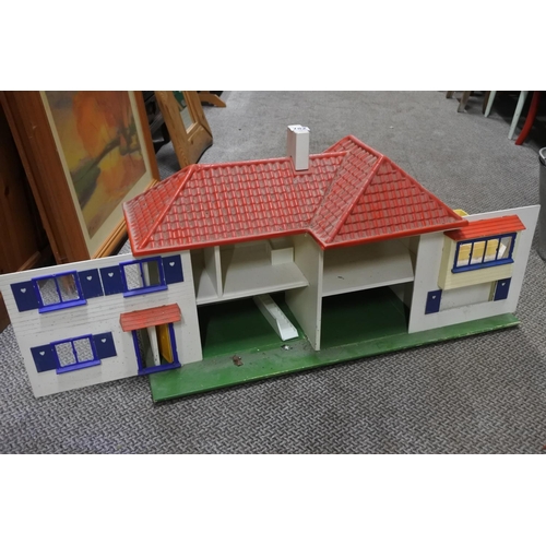 782 - A handmade wooden dolls house. approx 86x28x32cm.