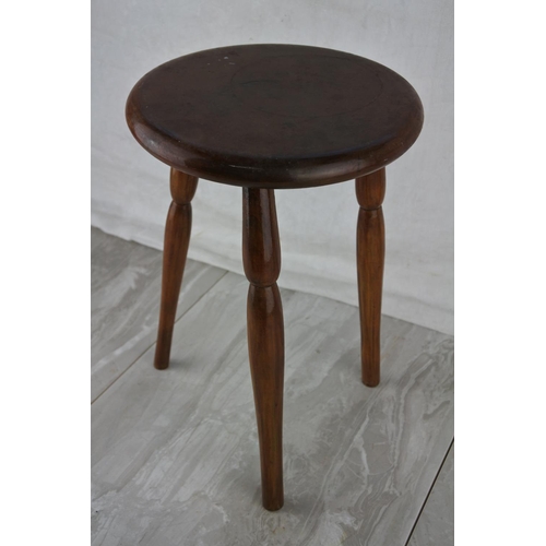 784 - A miniature three legged stool. approx 30cm.