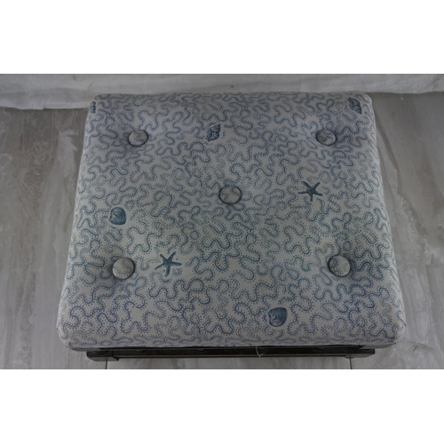 786 - A small upholstered footstool. approx 19x30x26cm.