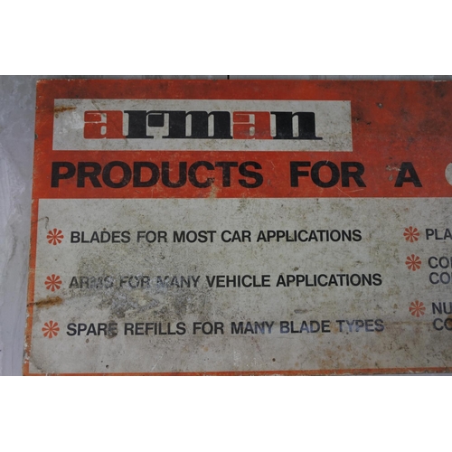 796 - A vintage card advertising sign for Arman car products.