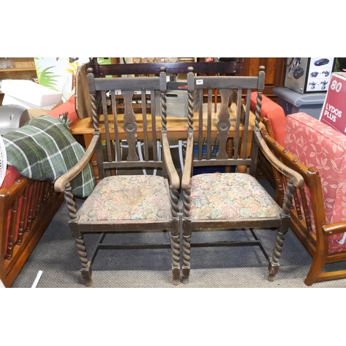 797 - A pair of antique oak armchairs for restoration.