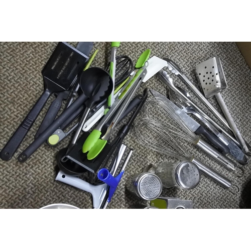 798 - A large lot of kitchen utensils, stainless steel bowls and more.