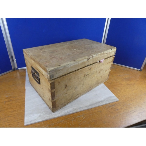 808 - A stunning antique pine small trunk with a lot of vintage dolls clothes. approx 28x55x34cm.