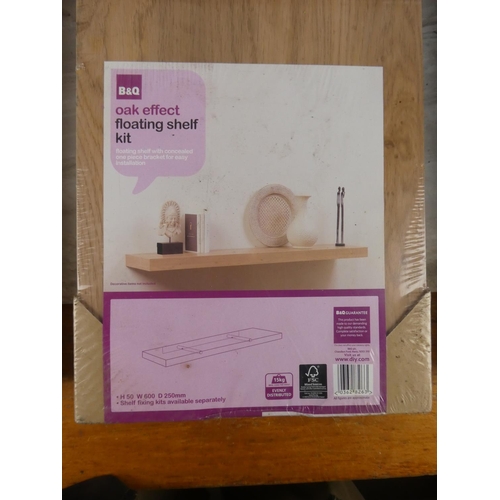 812 - Three B&Q oak effect floating shelf kits.