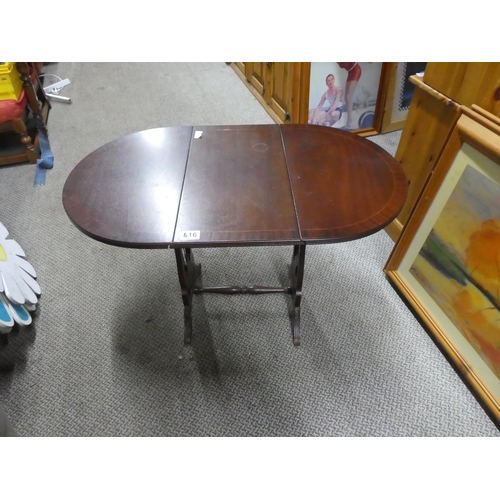 816 - A small mahogany dropleaf table. approx 53cm tall.