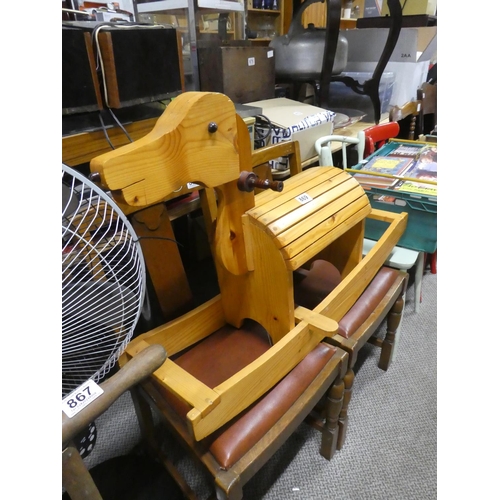 869 - A child's wooden rocking horse. approx 97x62cm.