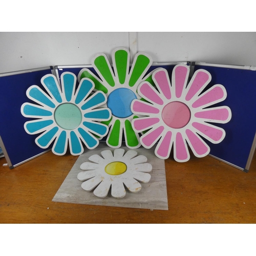 888 - Four various sized wooden sunflowers. largest approx 75cm.