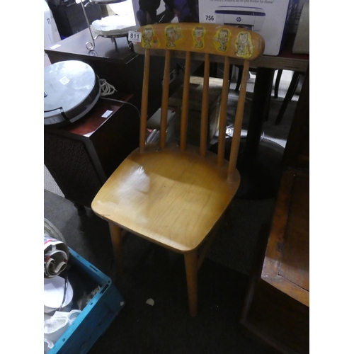 811 - A vintage pine chair.