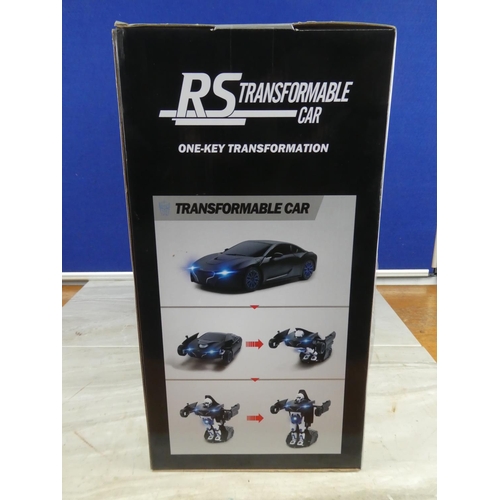 838 - A boxed Rastar RS Transformable Car.