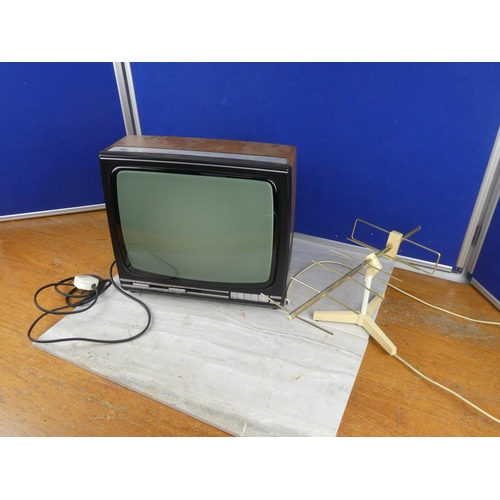 839 - A vintage ITT Featherlight Fifteen television and aerial. 15inch