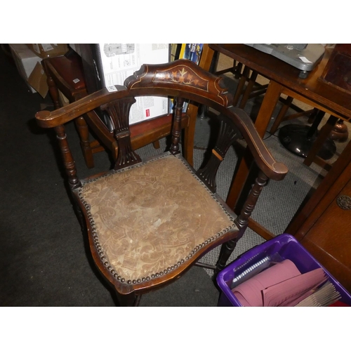 841 - An antique mahogany corner chair with inlay detail.