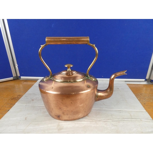 850 - A stunning antique copper kettle.