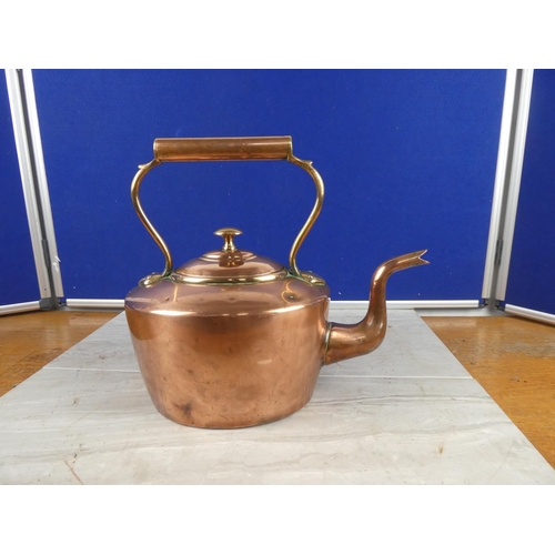 850 - A stunning antique copper kettle.