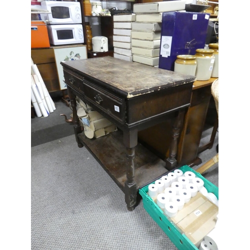 853 - An oak two drawer console table with undershelf. approx 81x94x44cm.