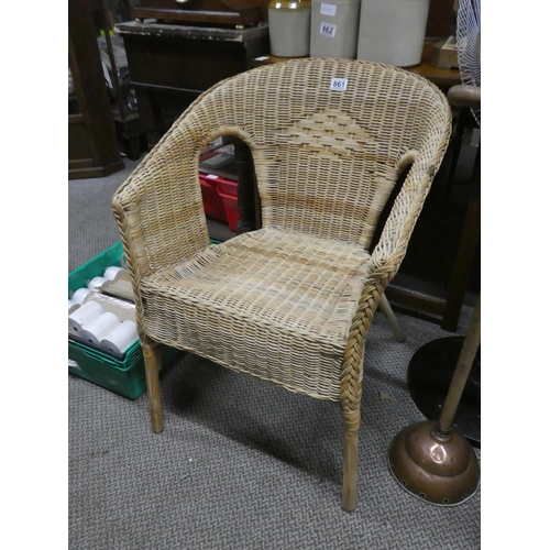 861 - A vintage rattan armchair.