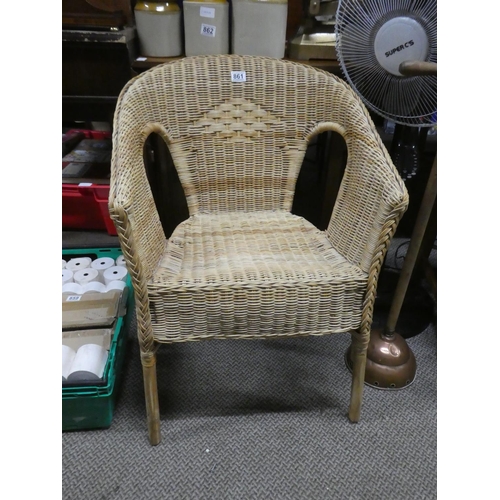 861 - A vintage rattan armchair.