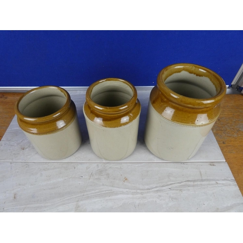 862 - Three antique style stoneware containers. approx 20cm (largest).