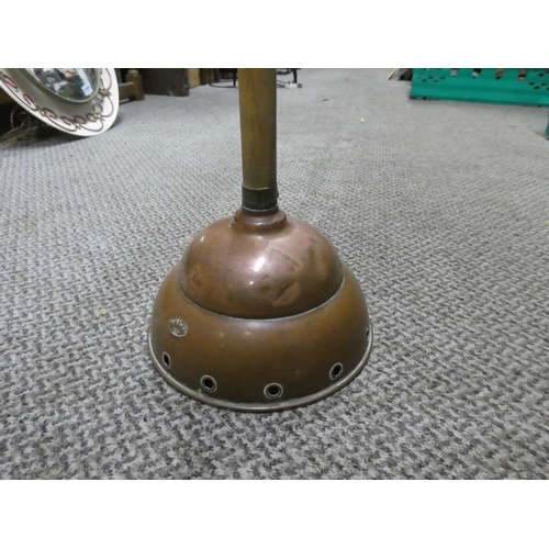 867 - An antique copper plunger. approx 83cm.