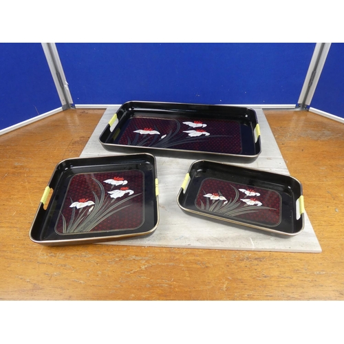 890 - A stunning set of three vintage trays. Approx 48cm.