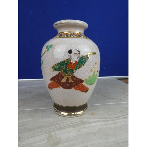 894 - An oriental style vase with hand painted detail.