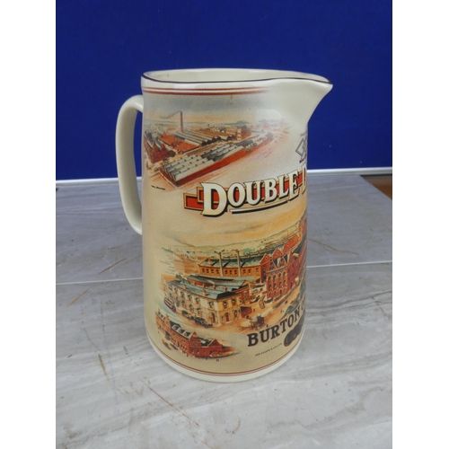 914 - A 'Double Diamond - Burton on Trent' pottery jug.