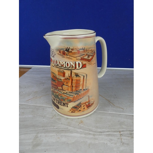 914 - A 'Double Diamond - Burton on Trent' pottery jug.