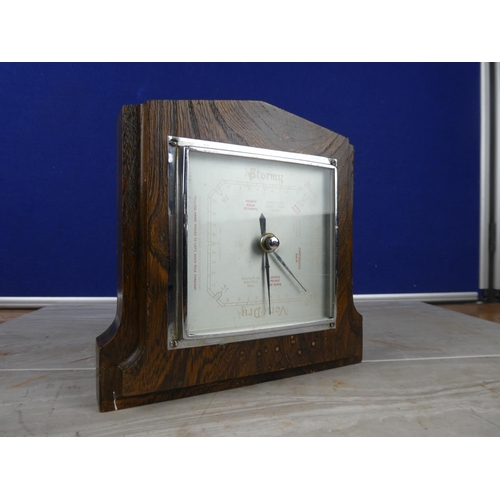 916 - A vintage oak cased barometer.