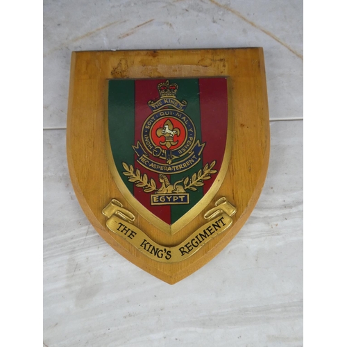 924 - A wooden shield wall plaque 'The King's Regiment'.17cm.