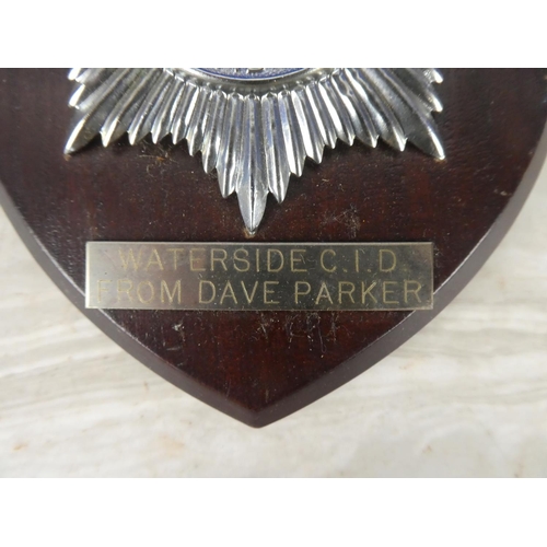 930 - A wooden shield wall plaque 'Nottinghamshire Constabulary - Waterside CID from Dave Parker'. 17cm.