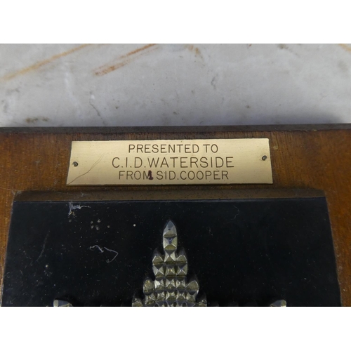 932 - A wooden shield wall plaque 'Coldstream Guards - Presented to CID Waterside from Sid Cooper'.17cm.