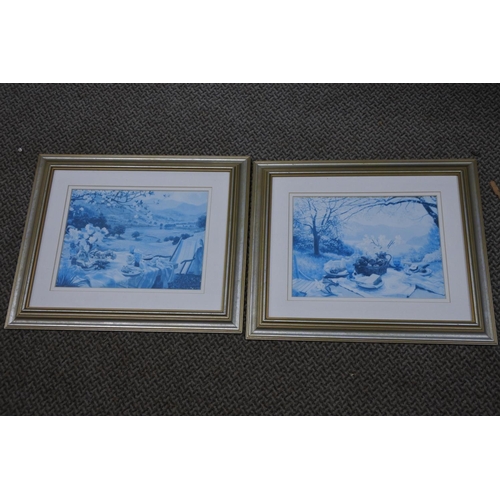 1008 - A pair of framed prints.