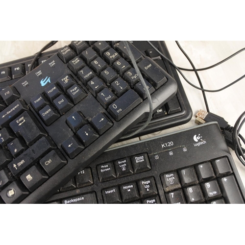 1014 - A Logitech K120 keyboard and two others.