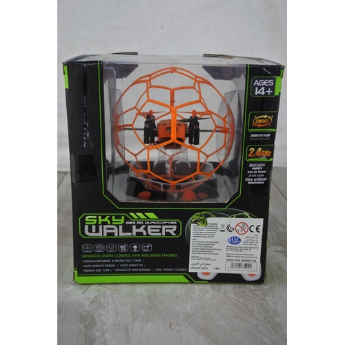 1020 - A boxed Helic Max Sky Walker mini RC quadcopters