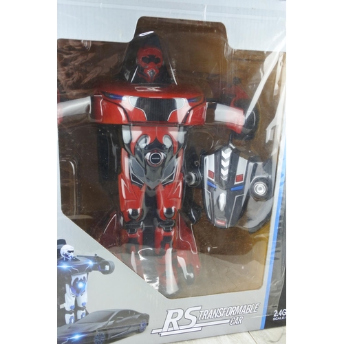 1029 - A boxed Rastar RS Transformable Car.