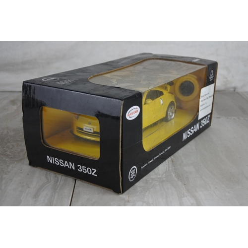 1031 - A boxed Rastar Nissan 350Z car.