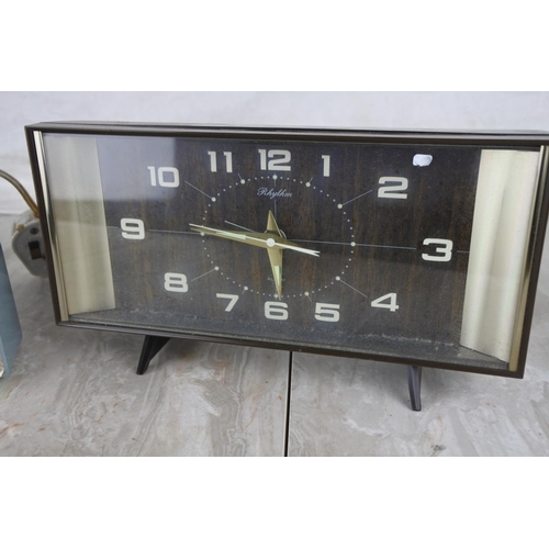 1035 - A vintage Rhythm mantle clock and a vintage Westclox Electric clock.