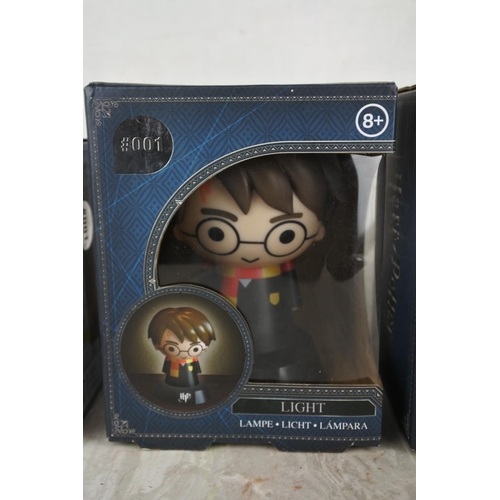 1038 - Three boxed Harry Potter lights.