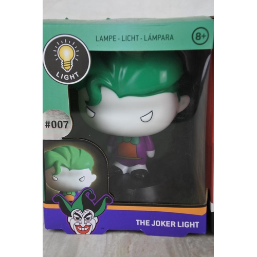 1040 - Two boxed lights 'The Joker' and 'Harley Quinn'.