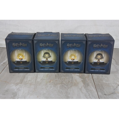 1045 - Four boxed Harry Potter lights.