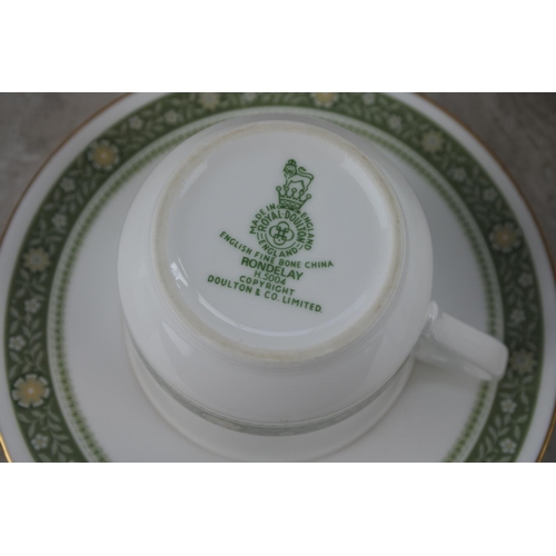 1047 - A Royal Doulton Rondelay pottery tea set, dinner plates and more.