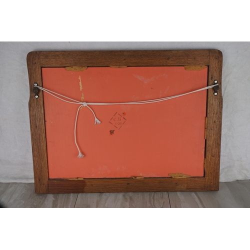 1049 - An oak framed wall mirror. approx 45x58cm.