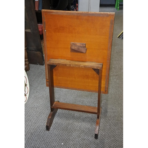 982 - A vintage firescreen/table with tapestry panel. approx 82x47cm.