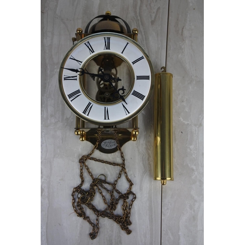 987 - A Tempus Fugit skeleton wall clock and weight.