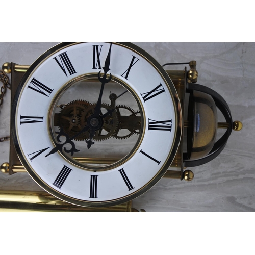 987 - A Tempus Fugit skeleton wall clock and weight.